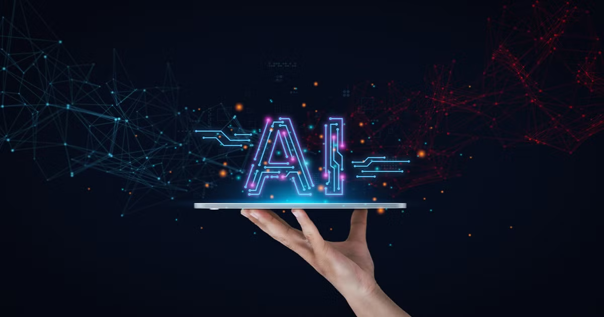 A hand holding a tablet projecting a glowing AI hologram